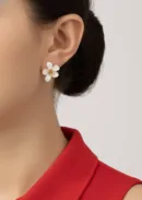 White Flower Stud Earrings with Gold Detailing